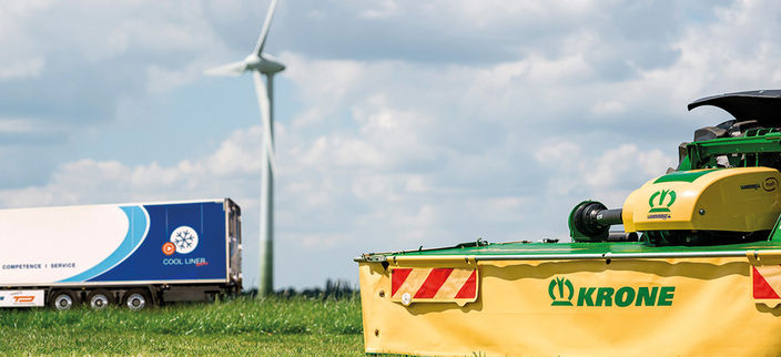 Windmühle, LKW, gelbe Plane mit der Aufschrift KRONE Windmühle, LKW, gelbe Plane mit der Aufschrift KRONE
