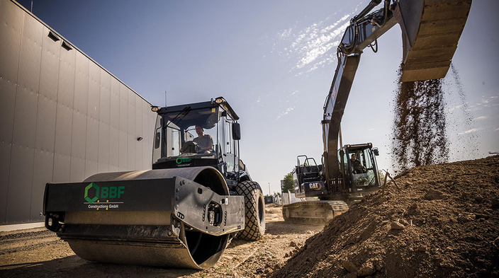 Baumaschinen auf einer Baustelle Baumaschinen auf einer Baustelle