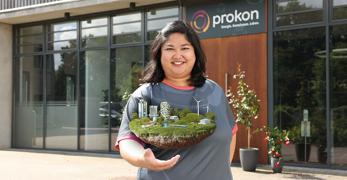 Junge Person vor dem Firmengebäude von Prokon