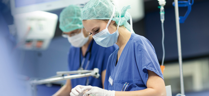 Personen im Operationssaal. Personen im Operationssaal.