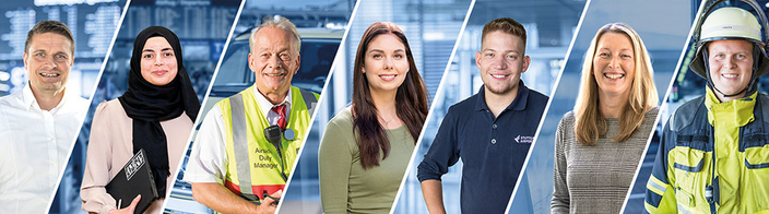 Sieben Personen in Arbeitskleidung verschiedener Berufsgruppen, die im Flughafenbetrieb mitarbeiten Sieben Personen in Arbeitskleidung verschiedener Berufsgruppen, die im Flughafenbetrieb mitarbeiten